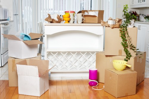 Professional movers handling furniture for removals in Harrow