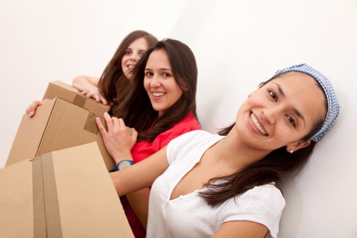 Loading furniture into a van for a Harrow relocation