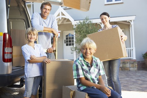 Local movers loading a van for a house or office relocation