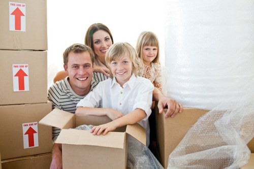 Harrow moving van loading items for a residential relocation