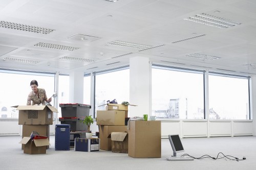 Professional movers handling furniture during a house move