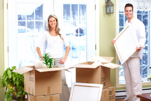 Moving van and packing boxes outside a Harrow property